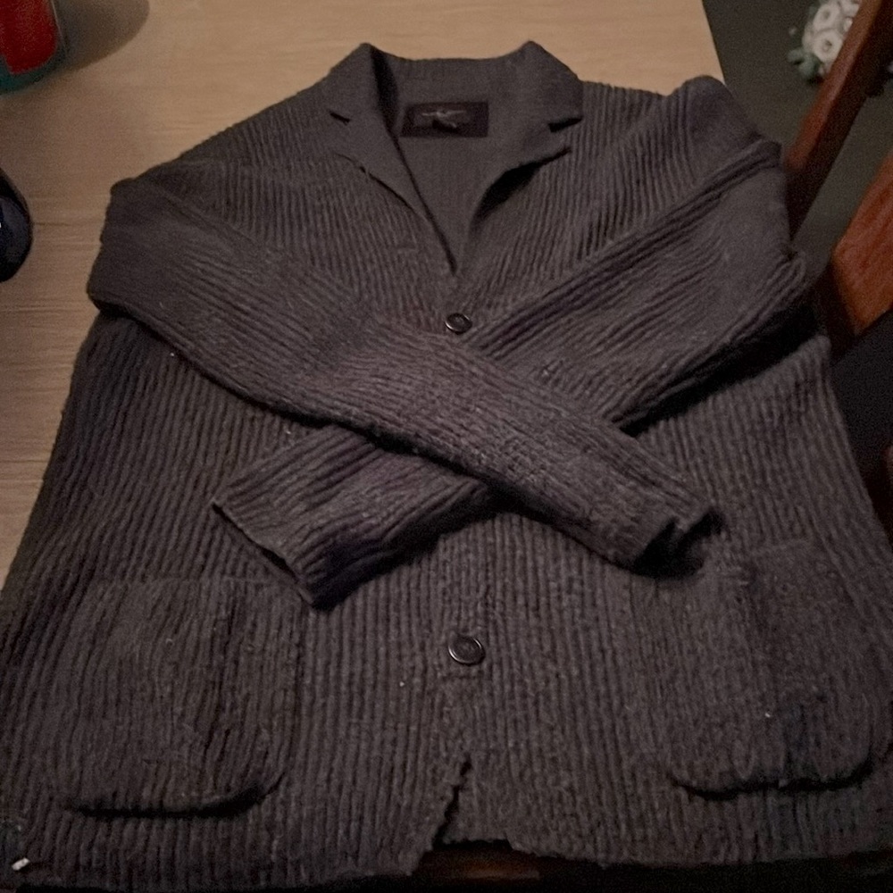 Polo Black Brown Grey sweater with two pockets.